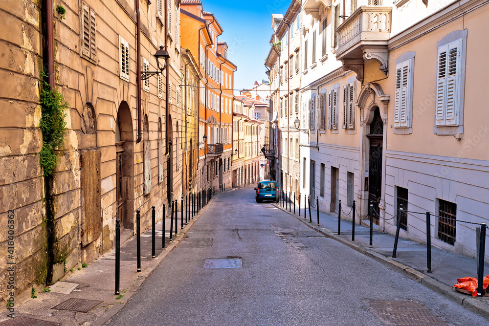 Fototapeta premium Colorful Italian narow street in Trieste view