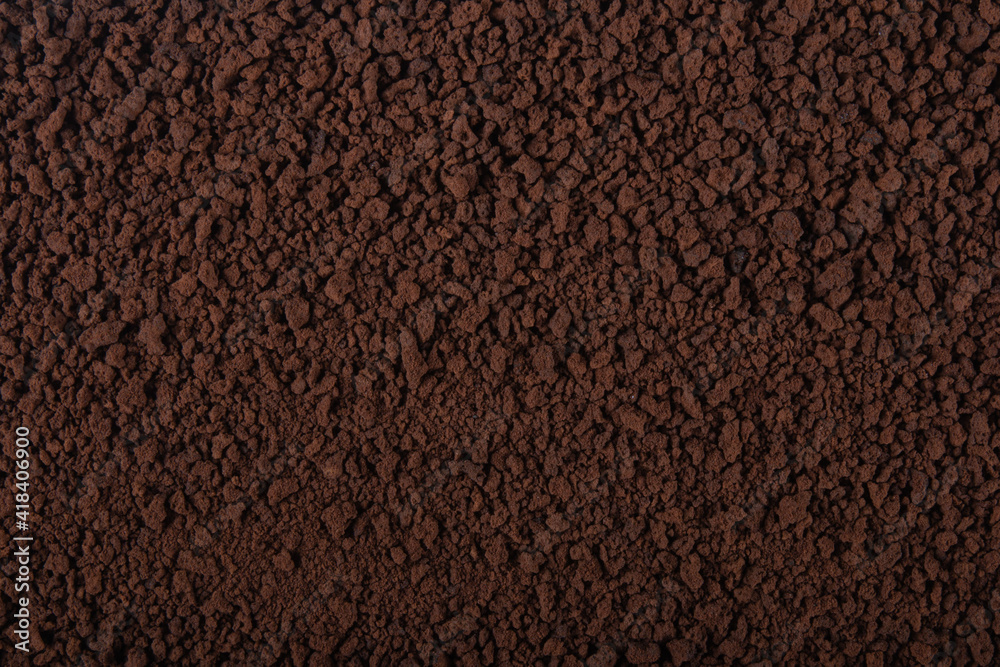 Fototapeta premium Black granulated coffee texture background