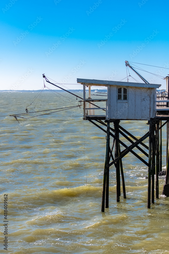 Royan in France, typical huts on stilts on the coast
Royan in France, typical huts on stilts on the coast
