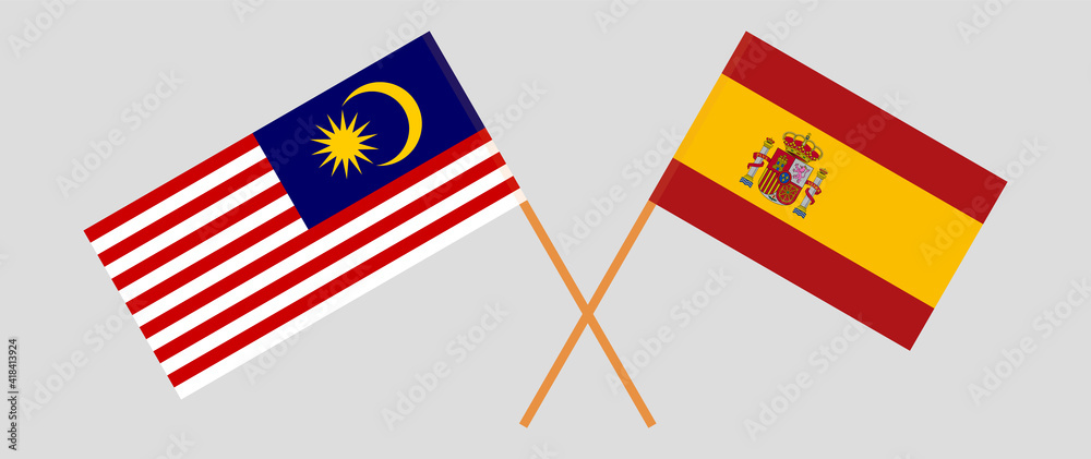 Crossed flags of Spain and Malaysia. Official colors. Correct proportion