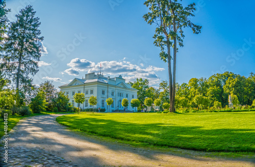 Beautiful sunny day in Uzutrakis Manor. Palace of the graph Tyszkiewicz. photo