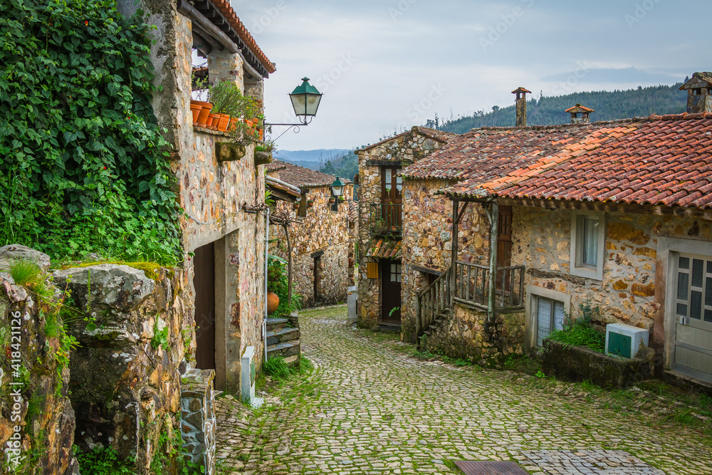 Stone houses in the mountain village of Casal de Sao Simao. Tourist region of Aldeias de Xisto, Portugal