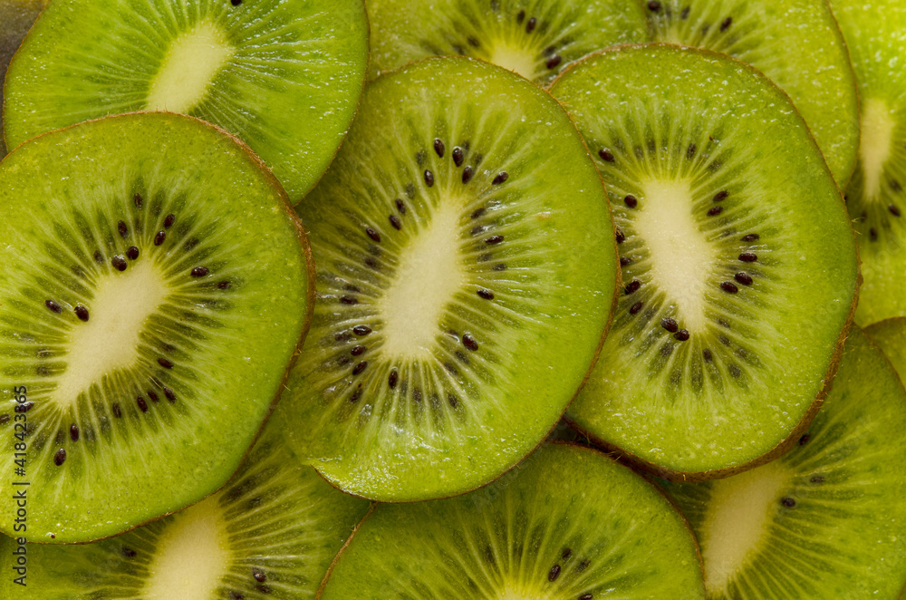 kiwi slices close up natural green background kiwi slices close up natural green background
