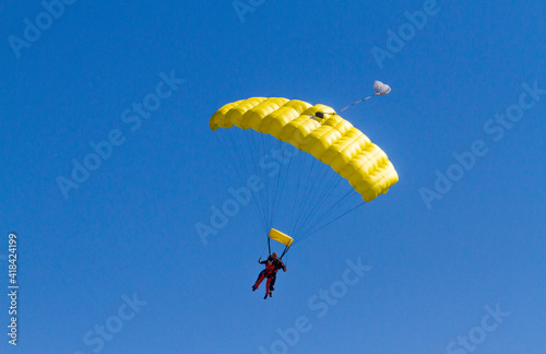 Canvas Print Skydive DeLand skydivers with parachutes open landing in Deland, Florida