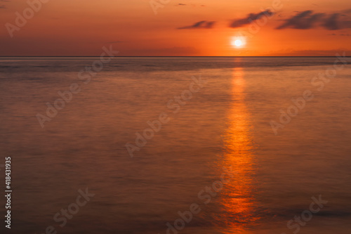 Island sunset over Pacific Ocean, Maui, Hawaii. © Danita Delimont