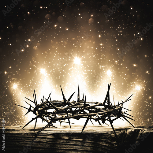 Fototapeta Crown Of Thorns On Wooden Cross With Bright Sparkling Crown Of Light In Backgro