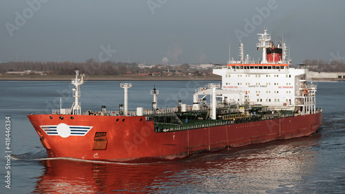 Oil tanker underway on the river Scheldt photo