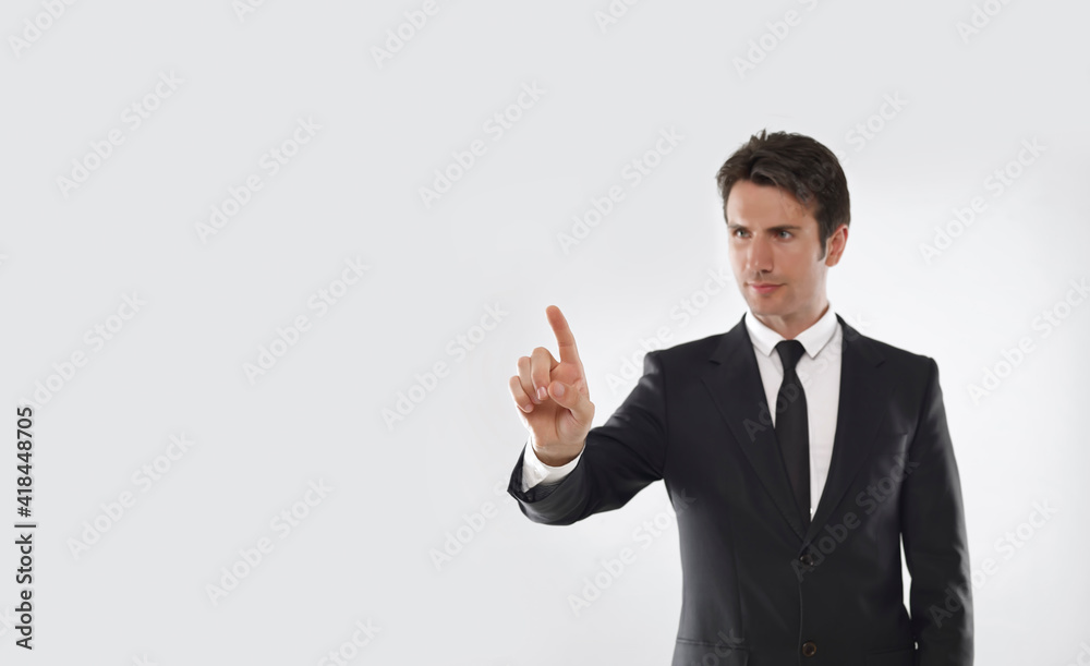 Man touching on a touchscreen with his finger Man touching on a touchscreen with his finger
