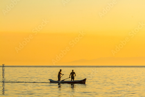 silhouette of a person in a kayak © Diego