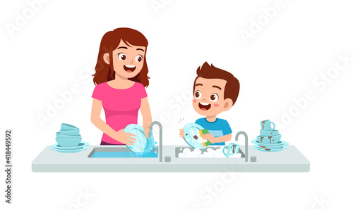 happy cute little boy washing dish with mother