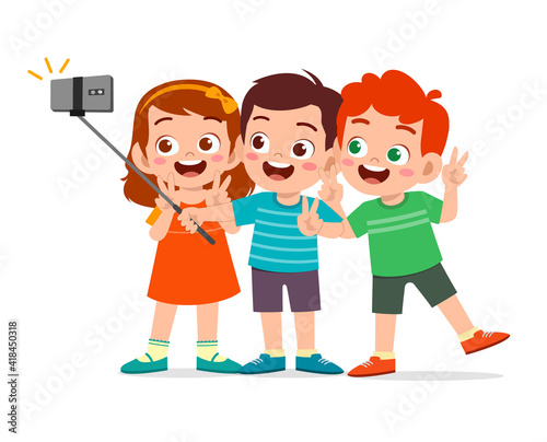 cute little boy and girl take selfie together