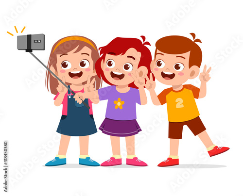 cute little boy and girl take selfie together