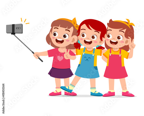cute little boy and girl take selfie together