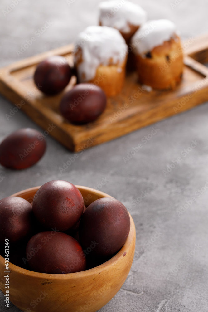 Obraz premium Still life many colorful easter eggs on a textural background. Rustic. Easter celebration concept.