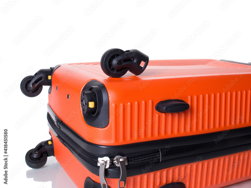 Orange suitcase with removable wheels. White background Orange suitcase with removable wheels. White background