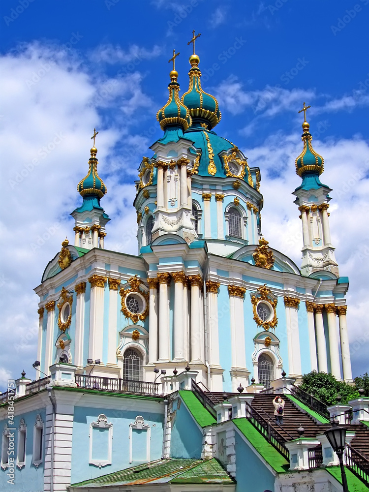antique beautiful St Andrey Cathedral in Kiev, Ukraine. heritage church on blue sky with white clouds in sunny day. Europe travel diversity