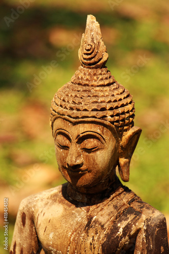 Wood carvings simulating Buddha statues, believes, respect. photo