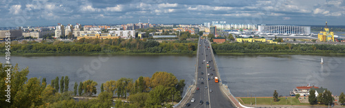Kanavinsky bridge in the city panorama on a sunny August day, Nizhny Novgorod