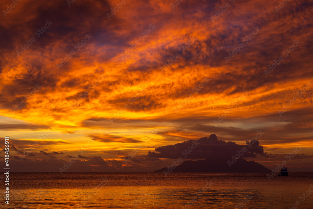 Beautiful sunset on the famous Beau Vallon beach on Mahe island, Seychelles