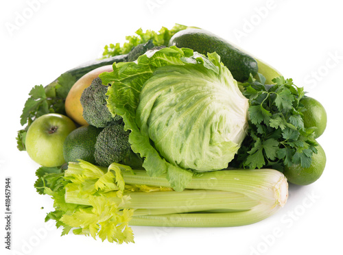 green fruits and vegetables on white background .