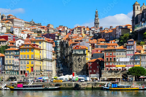 Cityscape of the city of Porto  Douro river with its old boat and its typical colored houses on the water s edge. Portugal.