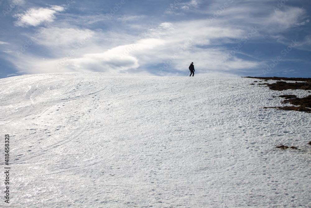 Snowshoeing in the Espinosa Mountains on a sunny day. Snowshoeing in the Espinosa Mountains on a sunny day.