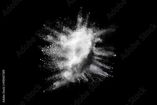 Explosion of white powder isolated on black background. Abstract colored background. holi festival.