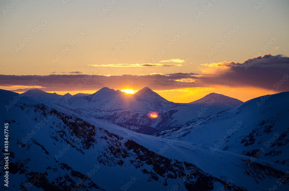 Sunset over Alaska mountains in winter