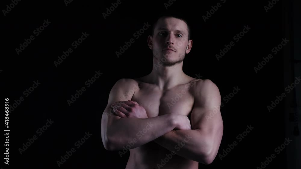 Man Crossed Hands Topless. Sportsman Standing Hands Crossed. Man Showing ABS, Muscles, Biceps, Shoulders Man Crossed Hands Topless. Sportsman Standing Hands Crossed. Man Showing ABS, Muscles, Biceps, Shoulders
