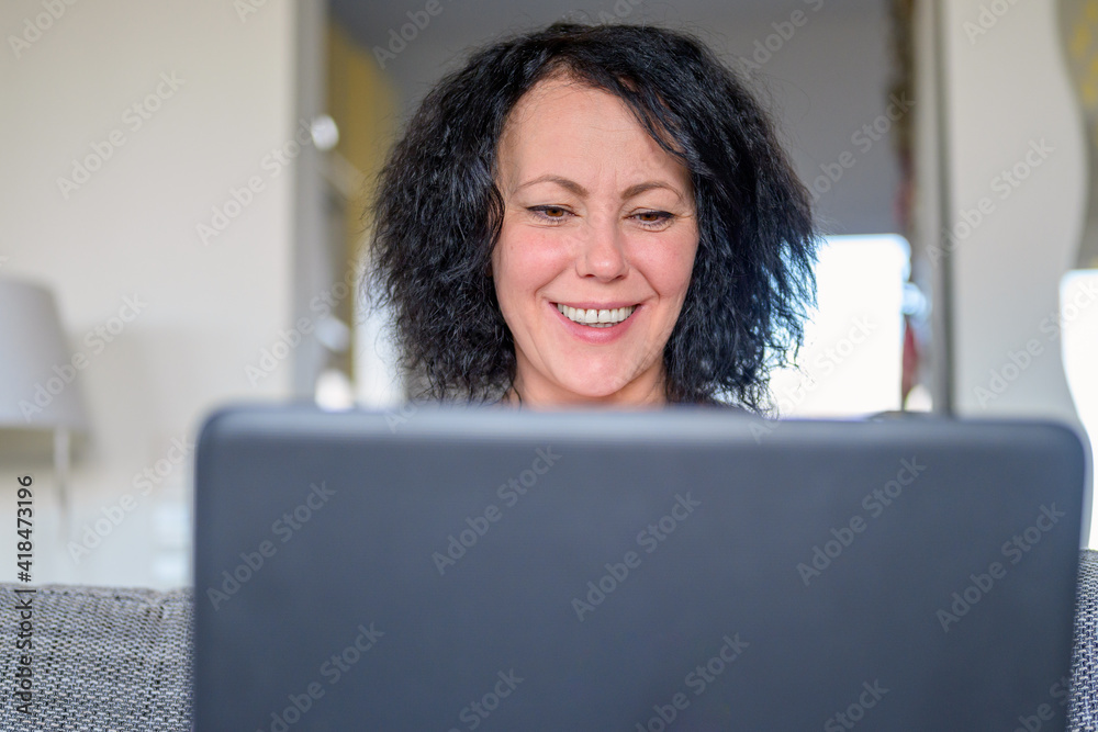 woman working on her computer