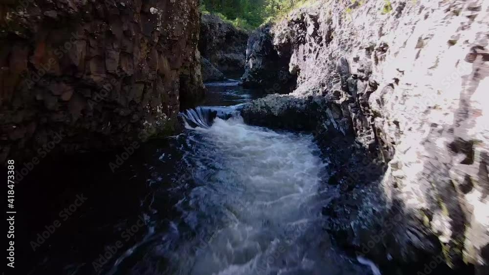 Beautiful waterfall and river of East Reunion island, Bassin La Paix