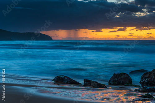 Wallpaper Mural Sunrise seascape with rain clouds on the horizon Torontodigital.ca