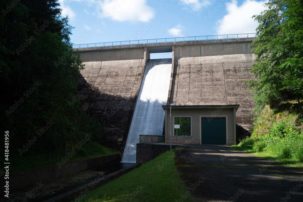 water flows powerfully from a dam in Thuringia water flows powerfully from a dam in Thuringia