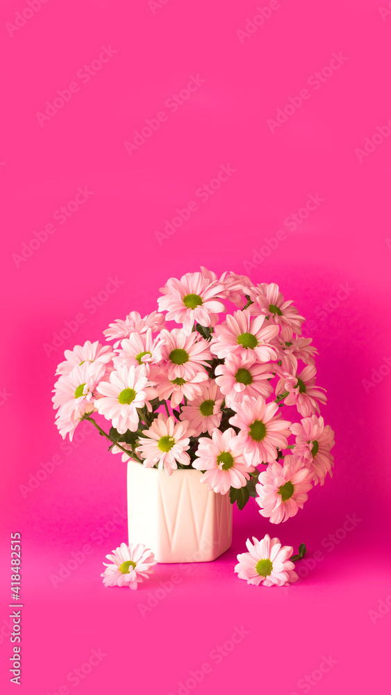 Colorful flowers bouquet on a bridht backgroung. Spring or summer card. Yellow and pink color concept.