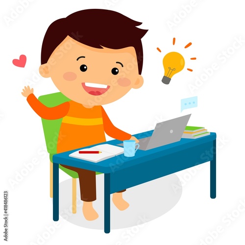 A boy is studying online at home