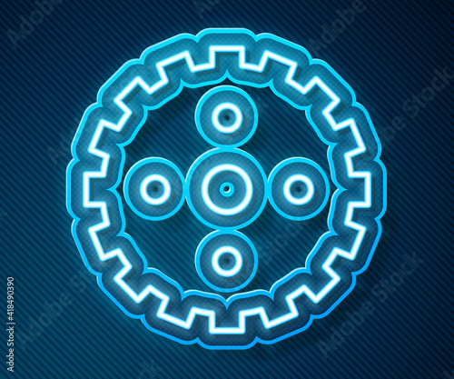 Glowing neon line Bicycle sprocket crank icon isolated on blue background. Vector.