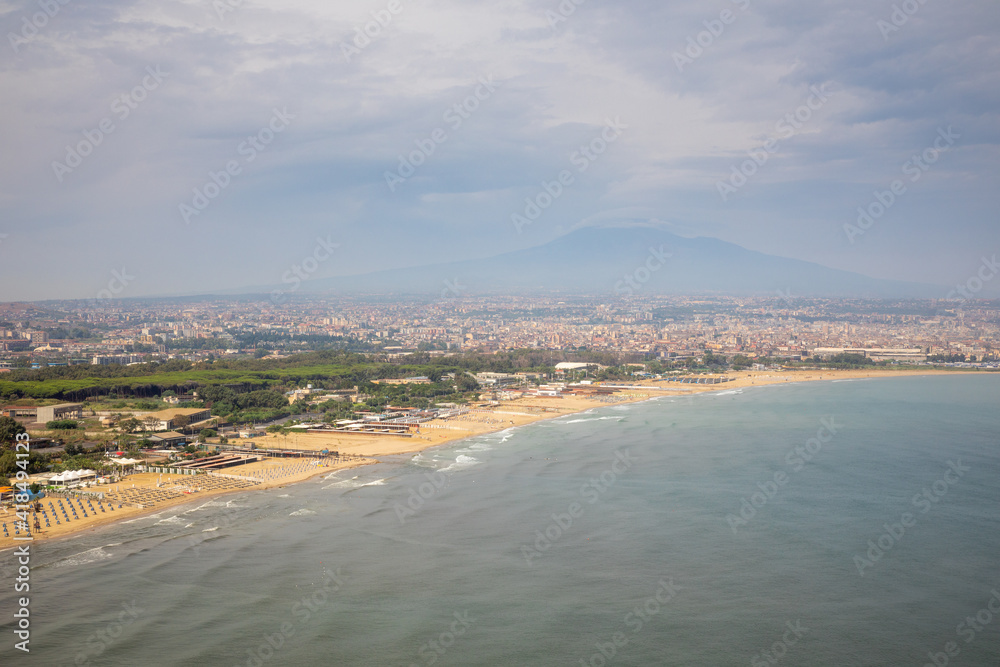 View of Mount Etna from the deck of a plane flying to Catania. Sicily Italy Summer 2020.