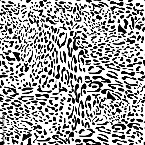 Leopard spots fur texture design. Seamless pattern. African animal fur background. Spotted ornament. Vintage style. Good for wrapping, banner, fashion, textile and fabric.