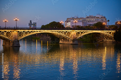 Isabel II bridge or Triana bridge, in Guadalquivir river at Evening,Sevilla,Andalucía,Spain, Europe. © Juanma
