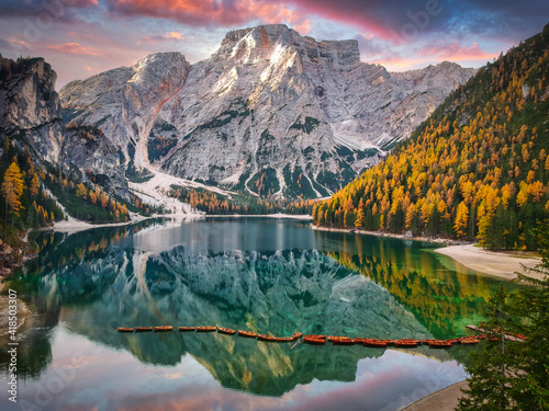 Lago di Braies lake and Seekofel peak at sunrise, Dolomites. Italy