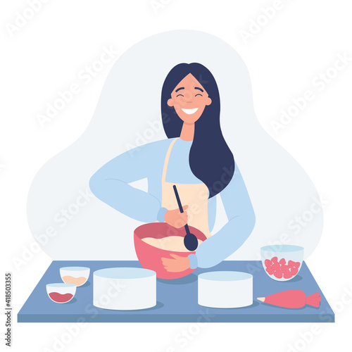 A young woman is stirring the dough. The confectioner bakes a cake