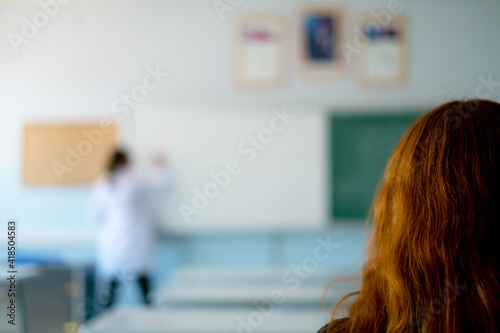 Teacher teaching in class