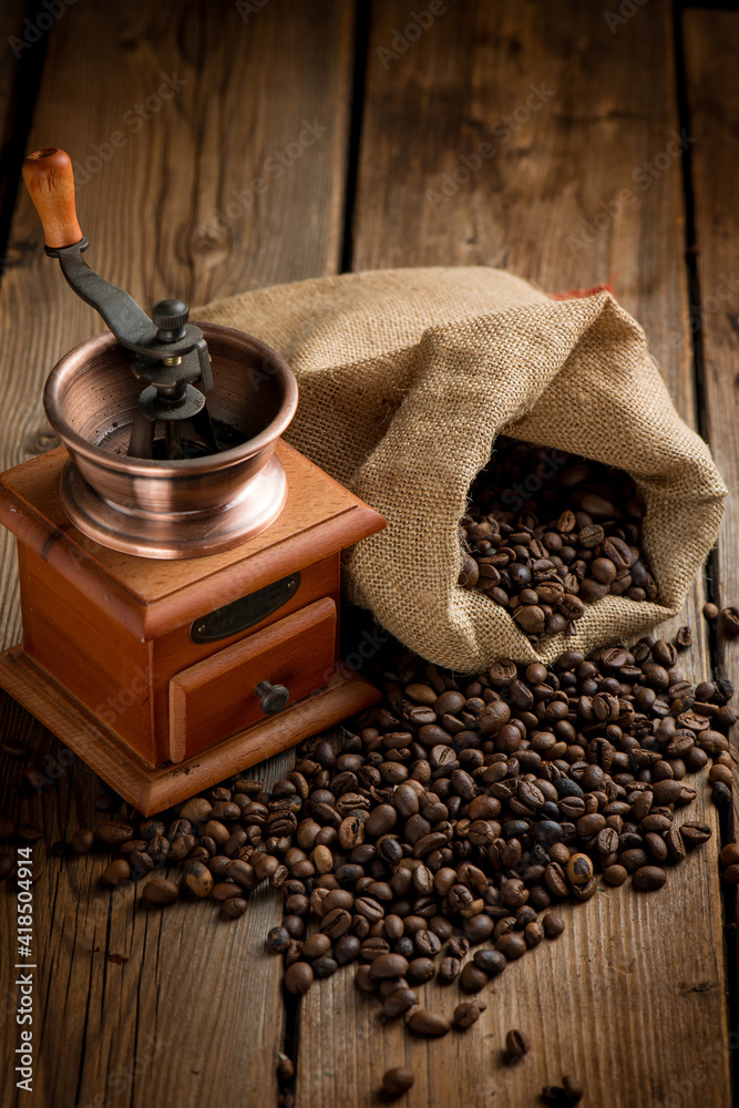 coffee grinder with coffee beans and bag