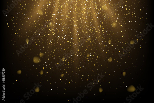 Fototapeta Golden glitter and sparkles in sun rays background