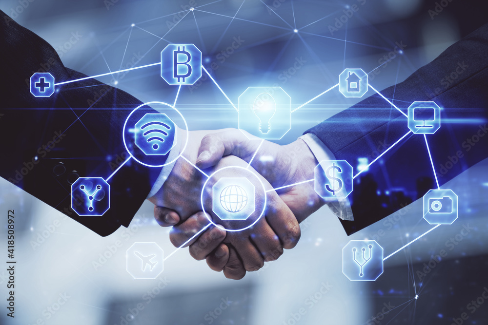 Double exposure of social network theme hologram and handshake of two men. Double exposure of social network theme hologram and handshake of two men.