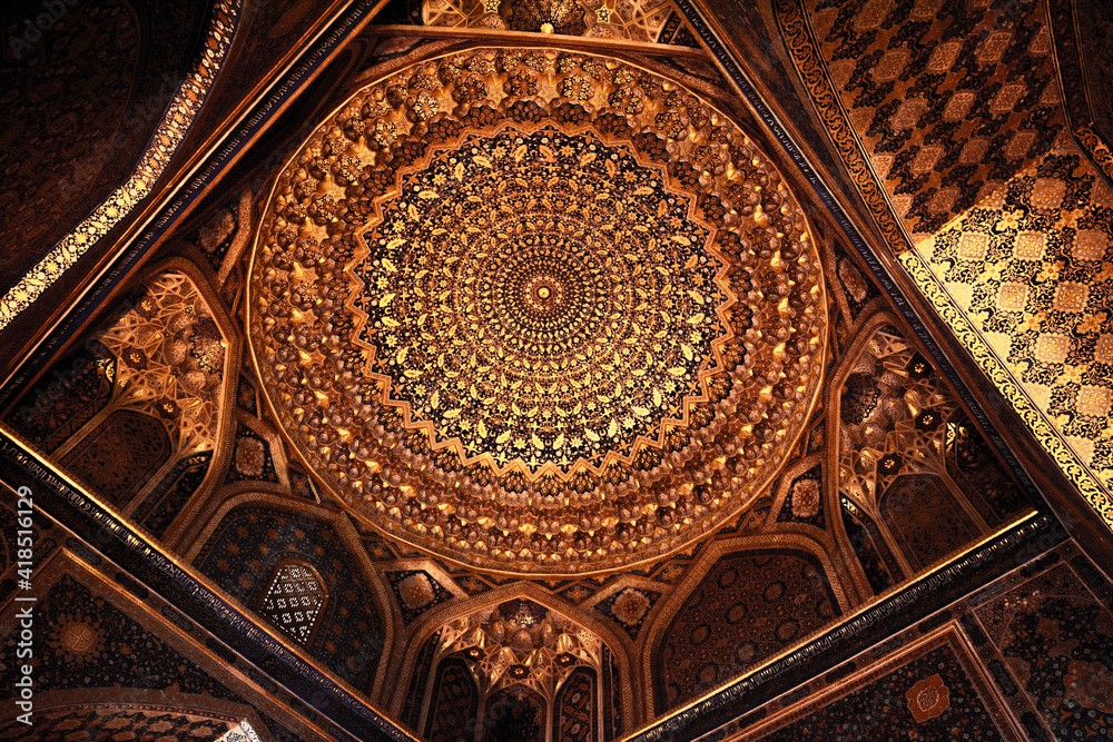 ceiling of the antique mosque with abstract pattern in warm colours 