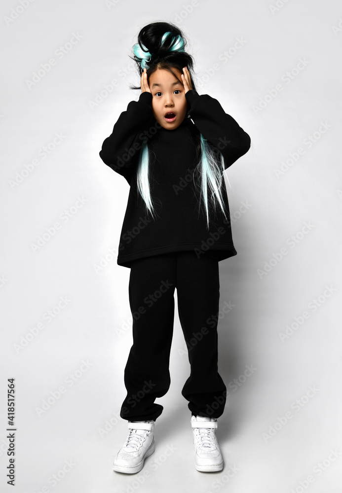 Portrait of a disappointed impression of a young girl yells, oh, hear the terrible news, new items are sportswear, isolated on light Portrait of a disappointed impression of a young girl yells, oh, hear the terrible news, new items are sportswear, isolated on light
