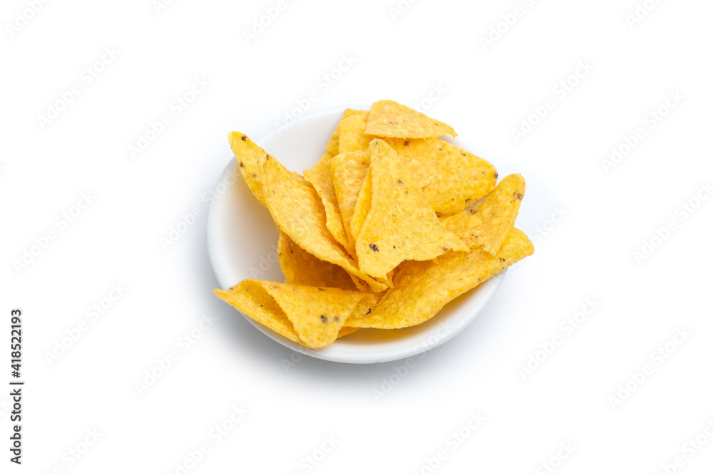 Tortilla chips in small white bowl isolated on white background Tortilla chips in small white bowl isolated on white background