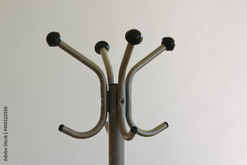 coat hanger detail on white wall coat hanger detail on white wall