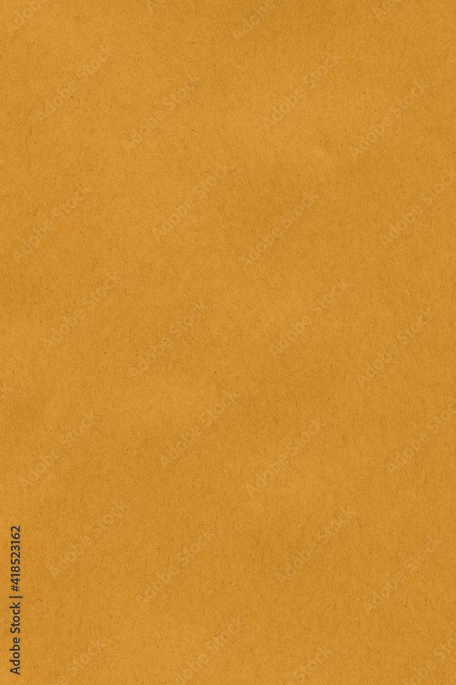 Obraz premium Mustard craft paper texture. Empty background.